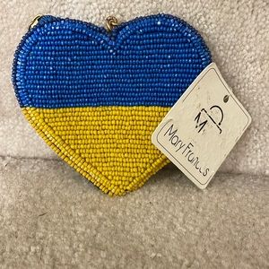 mary frances “love not war” hand beaded coin keychain for ukraine